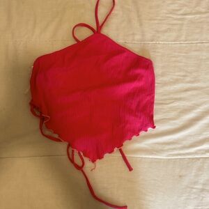 X cross cropped pink shirt